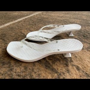 White plastic kitten heel sandals